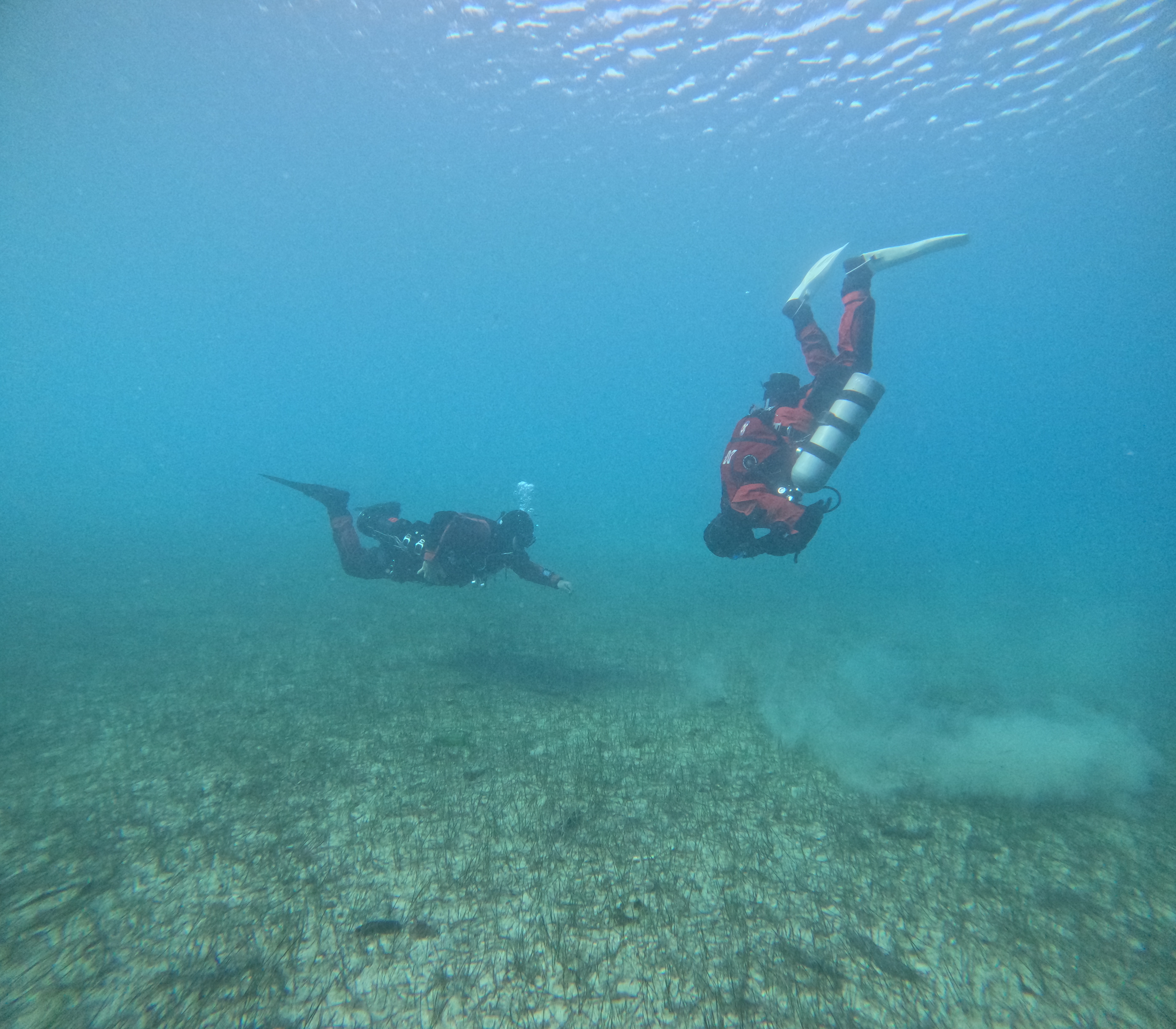 Tech divers in shallow water