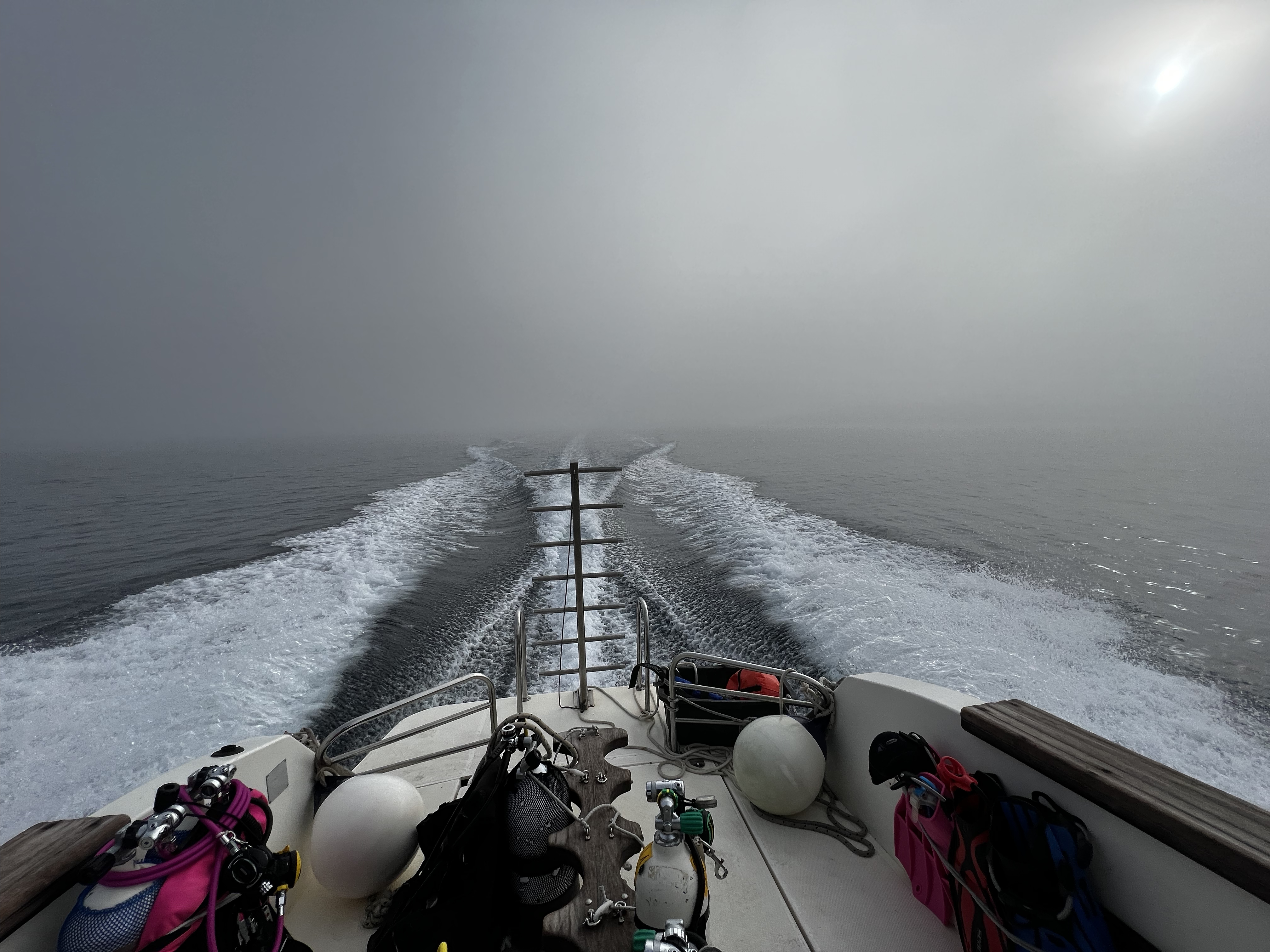 Stern of the boat in the fog
