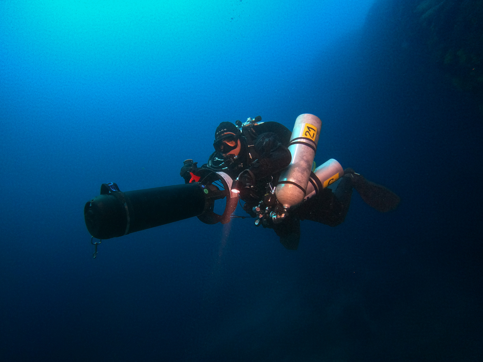 Technical diver with twin tanks